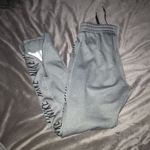 Nike dry-fit grey and black jogger sweatpants.